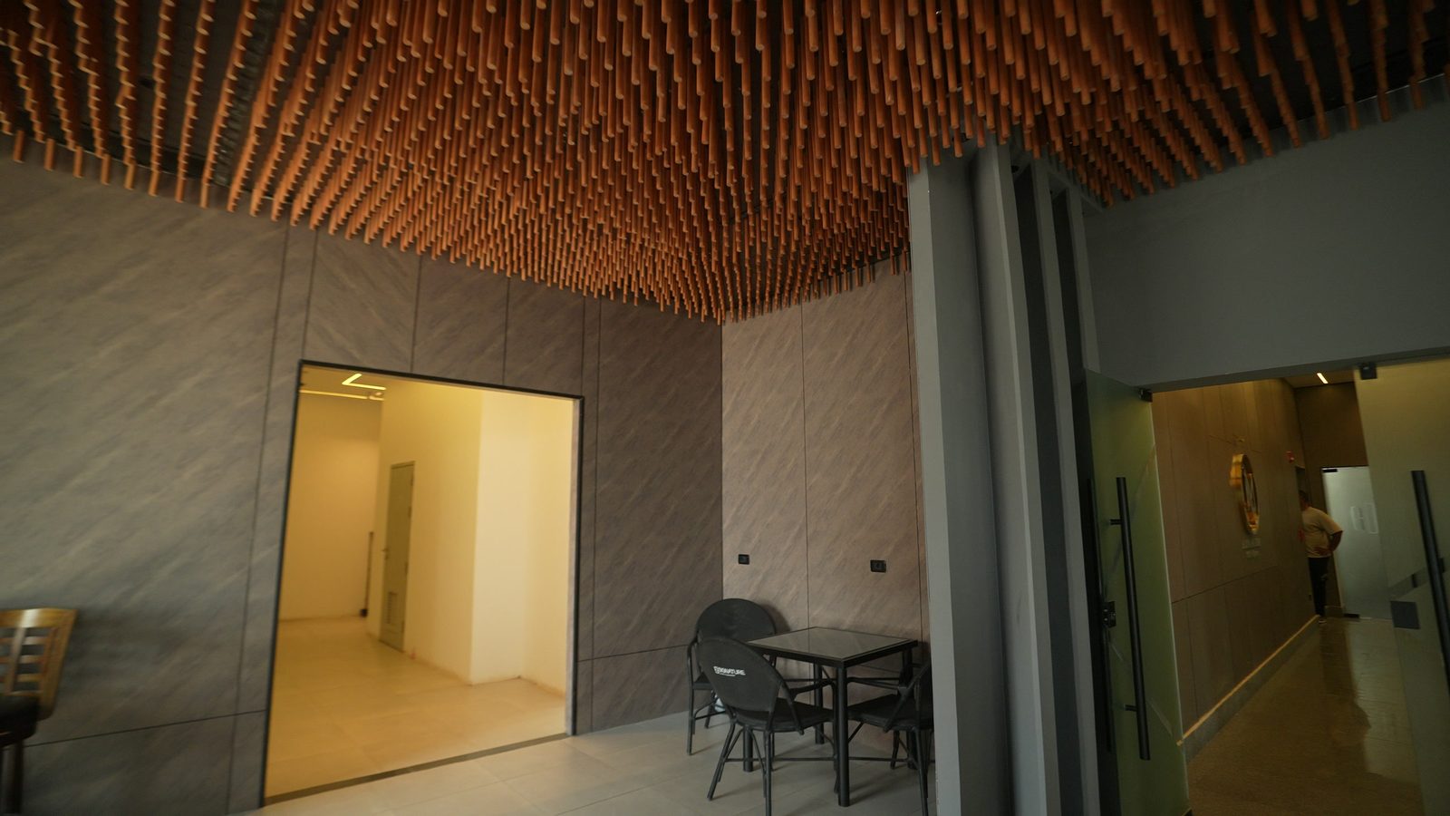 The lounge at The Aureum, copper ceiling